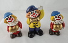 Tre statuine in ceramica molto