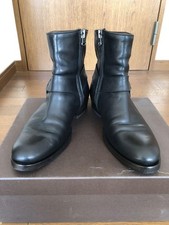 Stivali con imbracatura ad