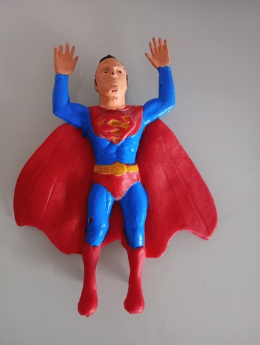 Superman action figure in - action,