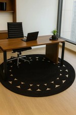 Tappeto rotondo in lana nera