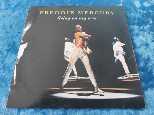 Freddie mercury living - –,