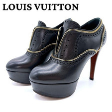 Stivaletti Louis Vuitton neri in pelle plateau motivo cerniera scarpe da donna US 5