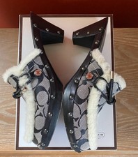 Zoccoli in legno COACH Italia