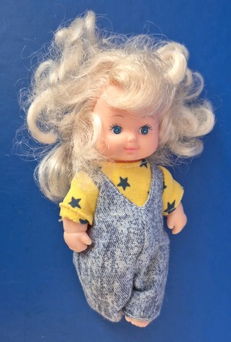 Bambola vintage vestita anni