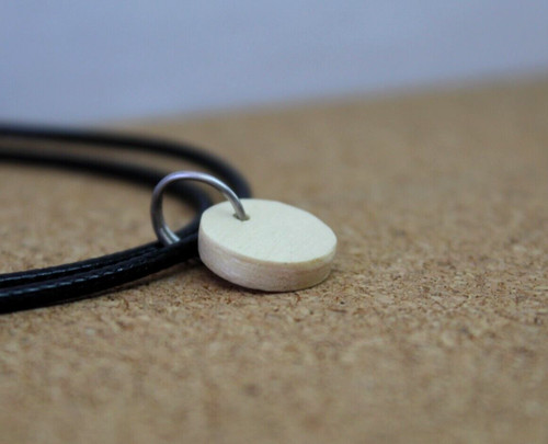 Collana ciondolo legno - in,