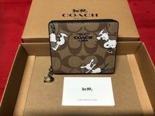Portafoglio Coach x PEANUTS Snoopy Print firma a scatto modello limitato C4591