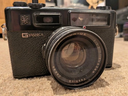 Macchina fotografica - , a
