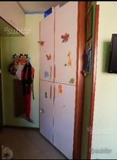 Armadio Angolare 90' con 4 sportelli e 5 ripiani 