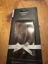 Pezzo di capelli Balmain tonalità di rosso