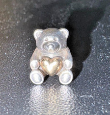Charm Pandora in argento e oro