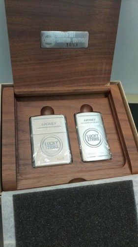 Coppia accendini olio - olio, zippo