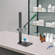 Tappatrice manuale profumo