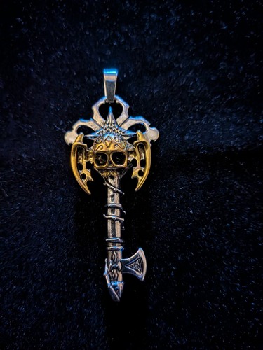 Croce chiave ascia teschio