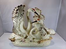 Statua uccellino vintage