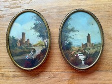 Coppia di quadri antichi ovali