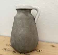 Vaso di fiori tondo in cemento