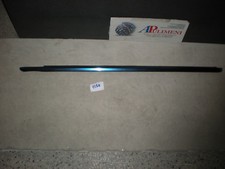 31/106 MODANATURA  BRONZO RASCHIAVETRO EST. POSTERIORE SX LANCIA THEMA 88 8.32