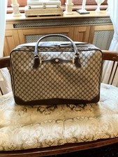 Valigia Gucci Monogram