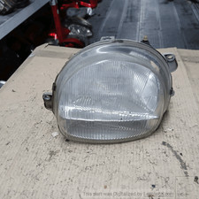 7701046215 Proiettore SX