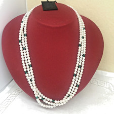 COLLANA A TRE FILI DI PERLE DI