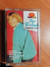 NINO D'ANGELO FOTOGRAFANDO