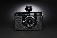 Custodia mezza fotocamera in