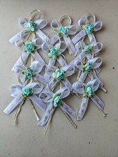 12 moñitos para bautizo