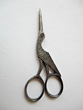 Antiche piccole forbici forbicine a forma di uccello