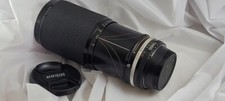 Obiettivo zoom professionale Nikon Nikkor 35-200 3,5-4,5 AI-S con paraluce HK15