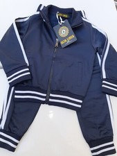 Tuta in Acetato ALTA LINEA Blu con Righe Bianche Laterali Divisa Scolastica 