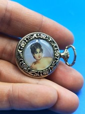 Piccolo orologio da tasca in argento e oro basso titolo d'epoca funzionante