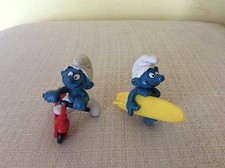 2 PUFFI SPORTIVI SU MONOPATTINO E CON TAVOLA DA SURF WINDSURF