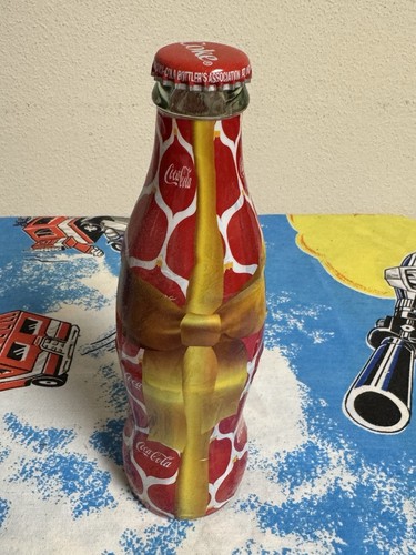 Bottiglia coca cola avvolta - bottiglia,