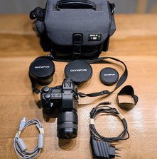 DOTAZIONE COMPLETA: fotocamera digitale Olympus E-20P con 4 obiettivi + pacchetto accessori