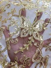 Tessuto Pizzo Oro con Disegno