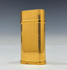 Accendino a gas Cartier oro Godron Trinity ovale senza scatola accensione confermata da JP
