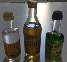 Lotto Quattro Bottigliette Mignon Da Collezione Camel Brandy Distillato Di Pere