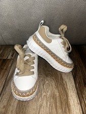 Sneakers bimbo/a n.23 bianche
