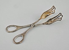 9330082 Versilberte Pinze per