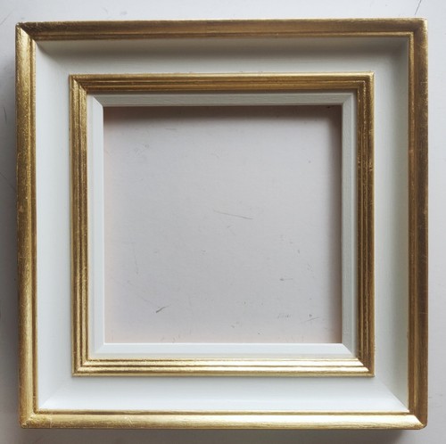 Cornice legno bianco - in,