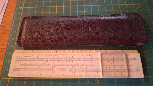 Piccolo regolo calcolatore - , con