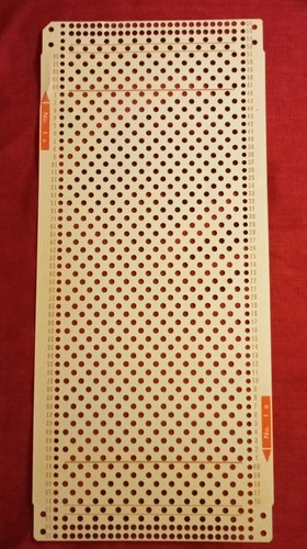 Una scheda perforata dal - , set