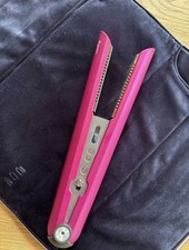 Piastra Dyson fucsia per capelli e senza fili. Mai utilizzata. Set completo