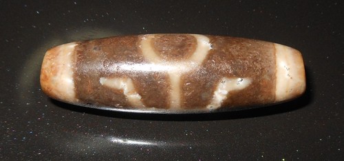 Amuleto gzi dzi - gzi,