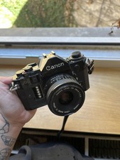 Canon A-1 con obiettivo Canon