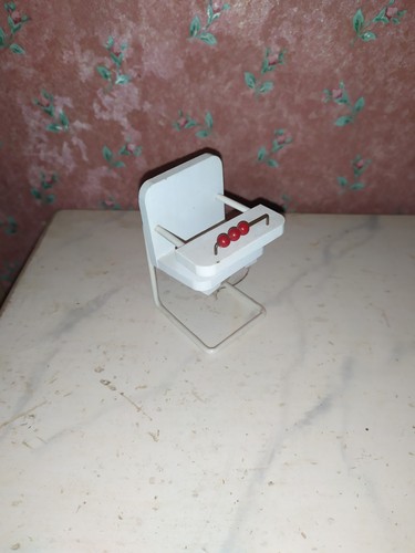 Vecchio seggiolone caco - vecchio,