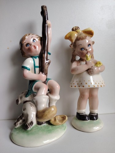 Coppia statuine tiziano galli - tiziano,
