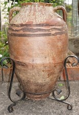 ANTICO ORCIO -ZIRO IN TERRACOTTA CON BASE IN FERRO BATTUTO H 67cm