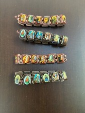 BRACCIALETTI CON SANTI 4 PEZZI AD ANELLO CON ELASTICO  DIAMETRO 5 cm ESTENSIBILE