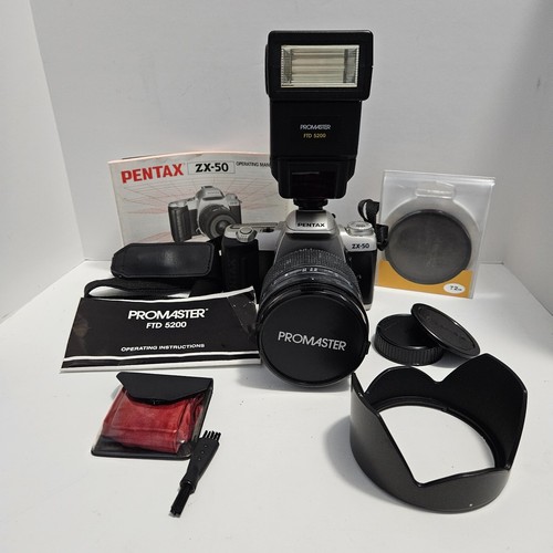 Pentax con obiettivo - con,